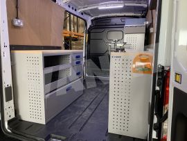 nearside aluminium van racking with work bench, aluminium drawers and drop down flap