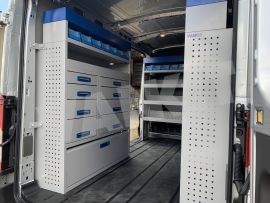 nearside van aluminium shelving and plastic linbins with aluminium drawers and blue services cases